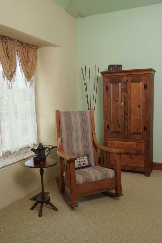 The home's design complements the couple's antique collection. Jason's great-grandfather's rocking chair is his favorite item in the home.